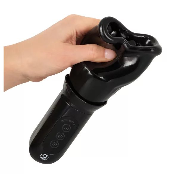 You2Toys - STROKER Rotating - акумулаторен, въртящ се мастурбатор с изкуствена уста (черен)